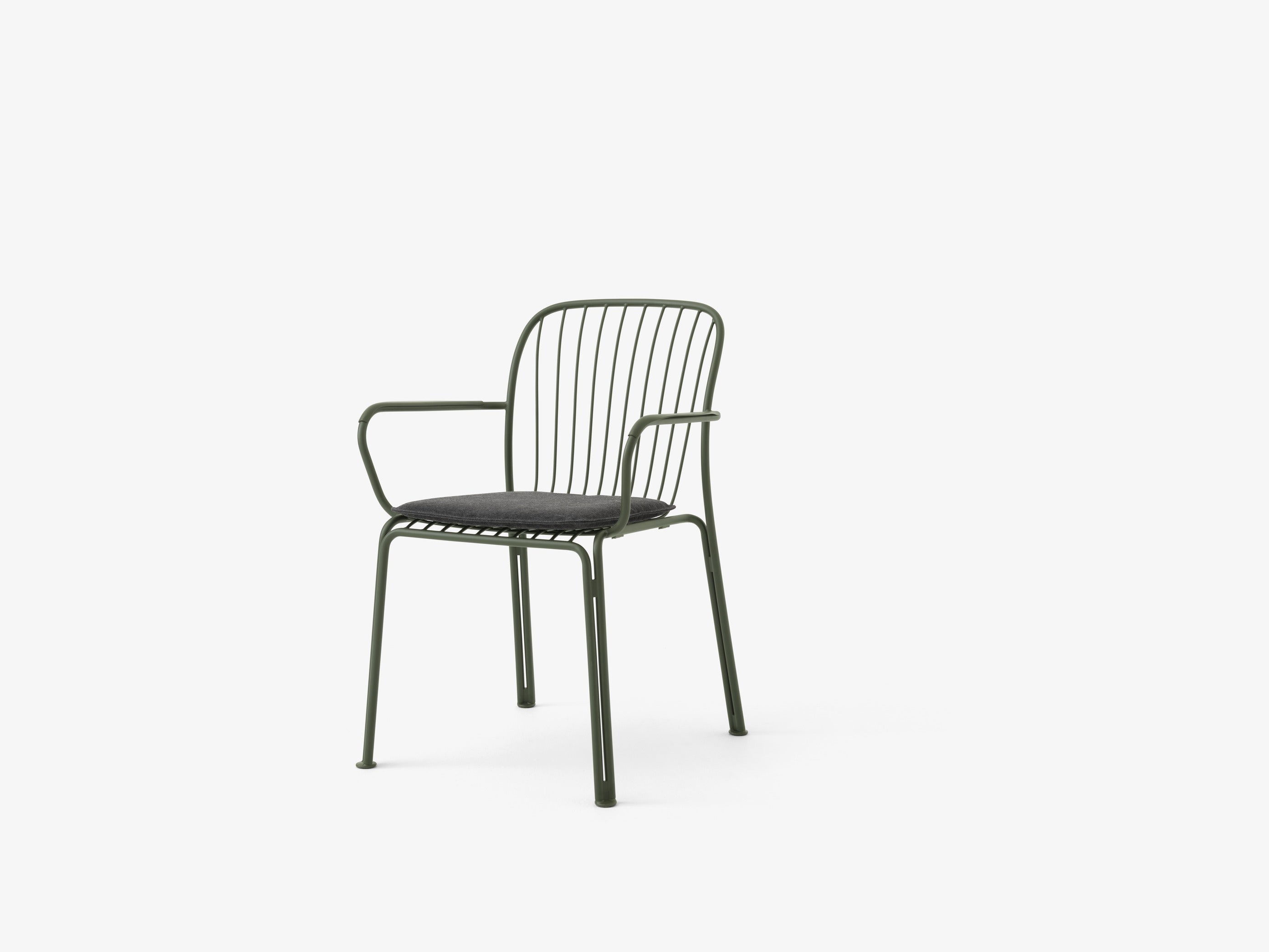 Thorvald Outdoor Armchair SC95 — Thorvald Chair SC95_Bronze Green_Thorvald Chair SC94-SC95 Seat Pad_Heritage Char_Angled front