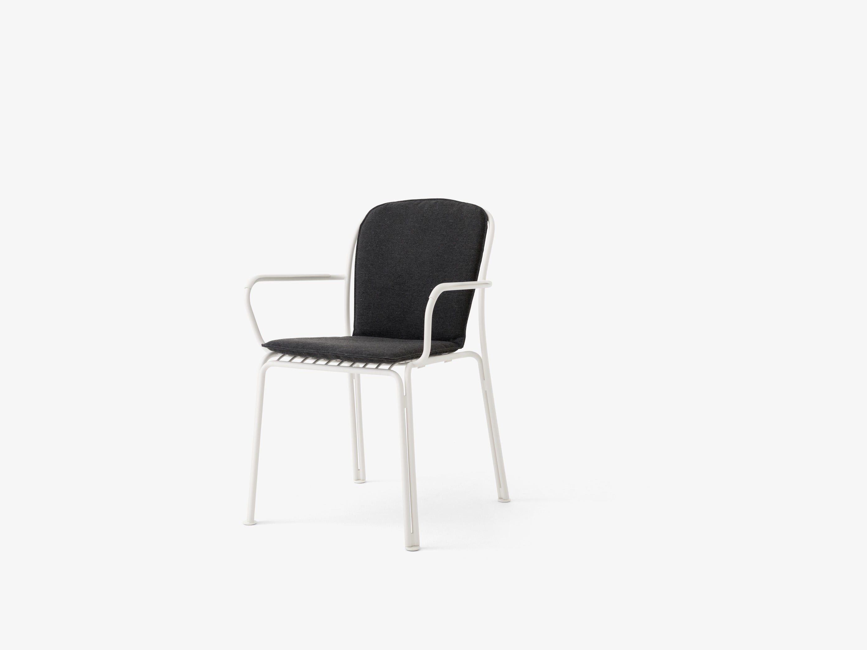 Thorvald Outdoor Armchair SC95 — Thorvald Chair SC95_Ivory_Thorvald Chair SC94-SC95 Cushion_Heritage Char_Angled front